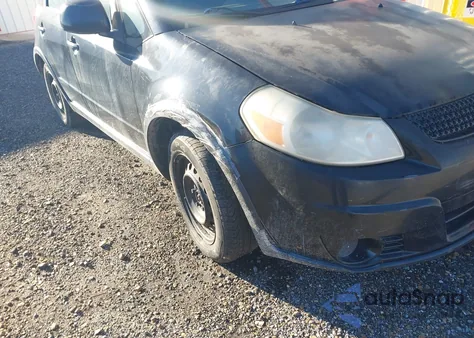 2010 Suzuki Sx4 Technology z USA, uszkodzony, nr VIN JS2YA5A32A6301282